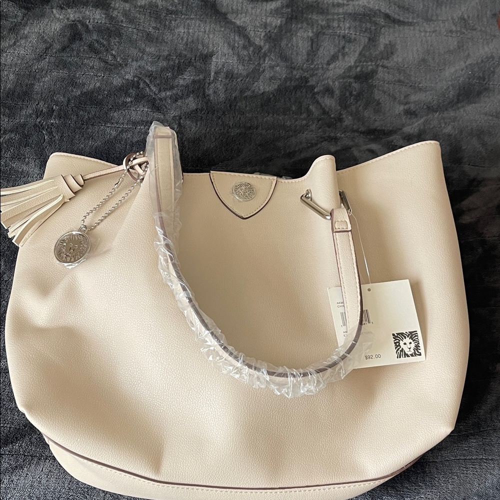 Anne Klein Cream Tote Bag with Tassel Charm